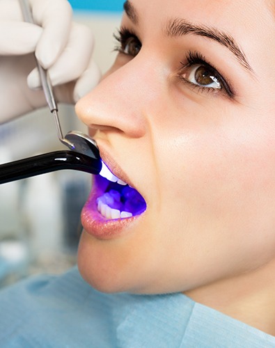 Patient receiving cosmetic dental bonding