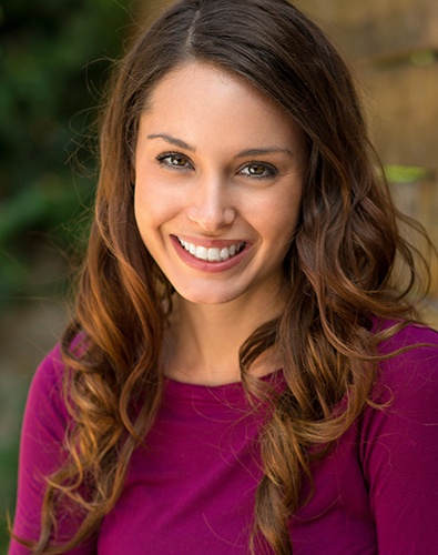 Woman sharing brilliant smile after teeth whitening