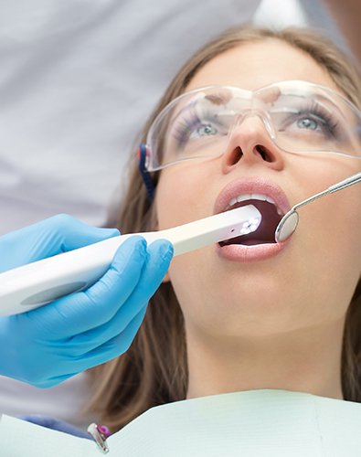 Dentist capturing intraoral images