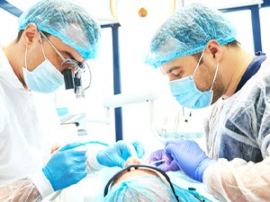 Oral surgeons placing dental implants in Denton, TX