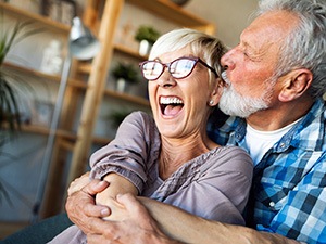 older couple smiling together 