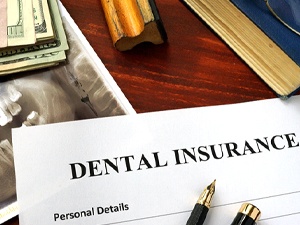 dental insurance form on table