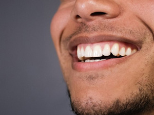 Close up of man’s smile