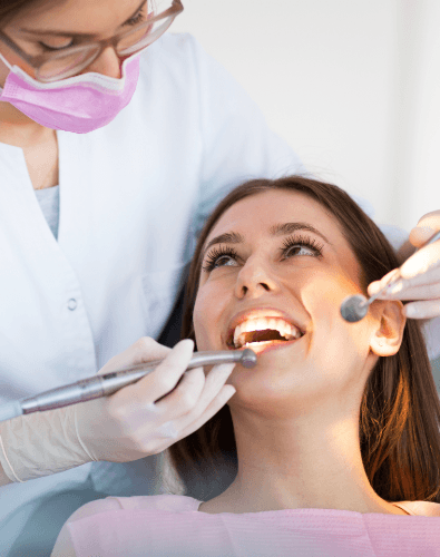 Patient receiving dental sealants