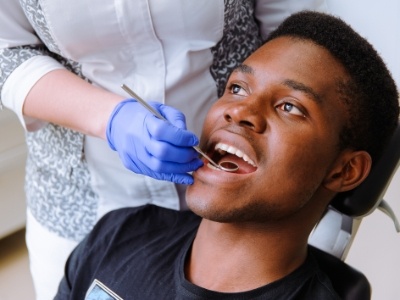 Man getting his teeth cleaned
