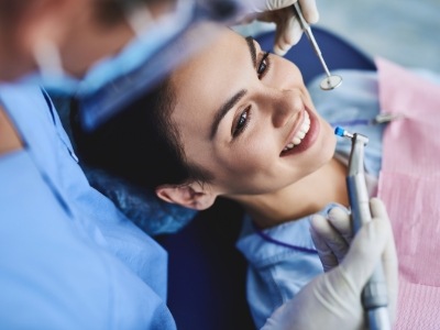 Woman getting her teeth cleaned