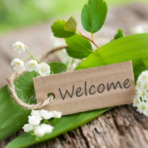 Friendly welcome sign for family dentist in Denton