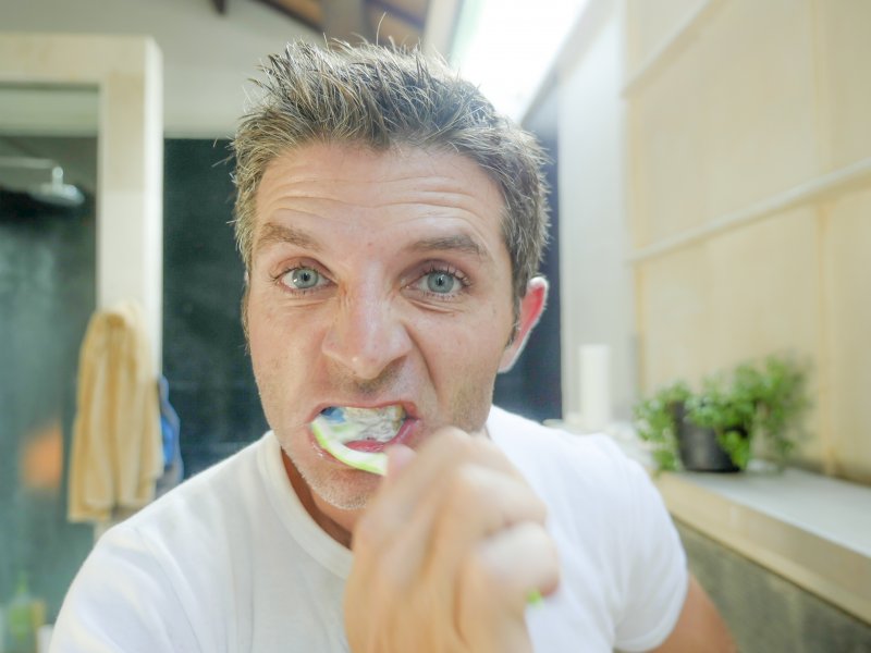 Man brushing his teeth