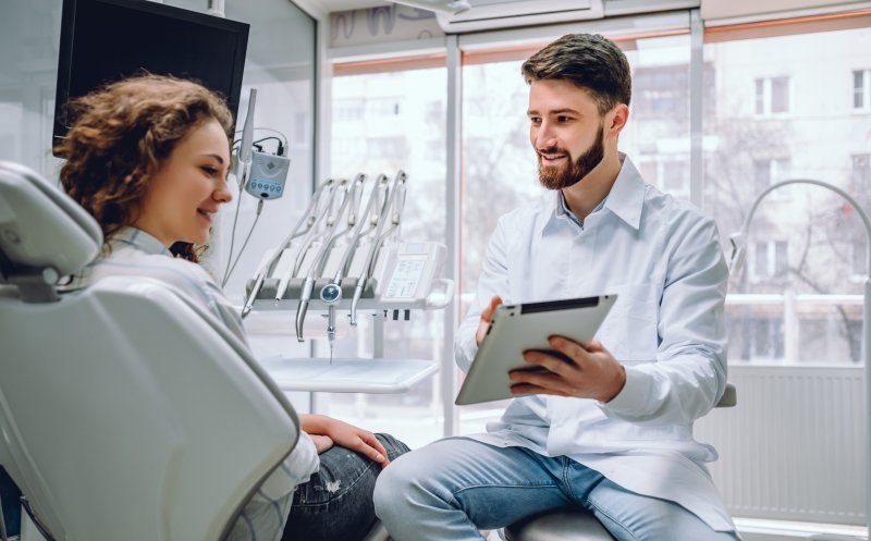 Woman as cosmetic dentist